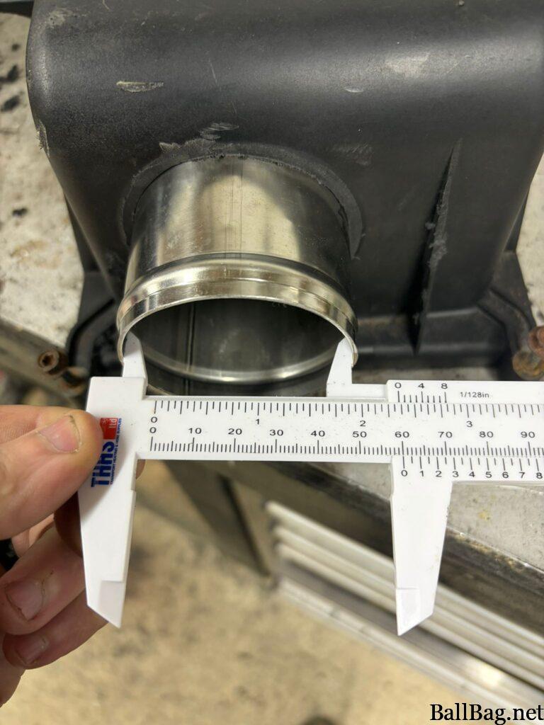 Stainless steel reducer epoxied into airbox