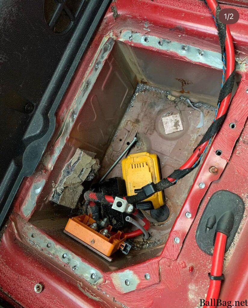 R56 exhaust fitment - boot floor view